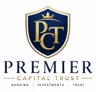 PremierCapitalTrust bank logo — gold and navy emblem
